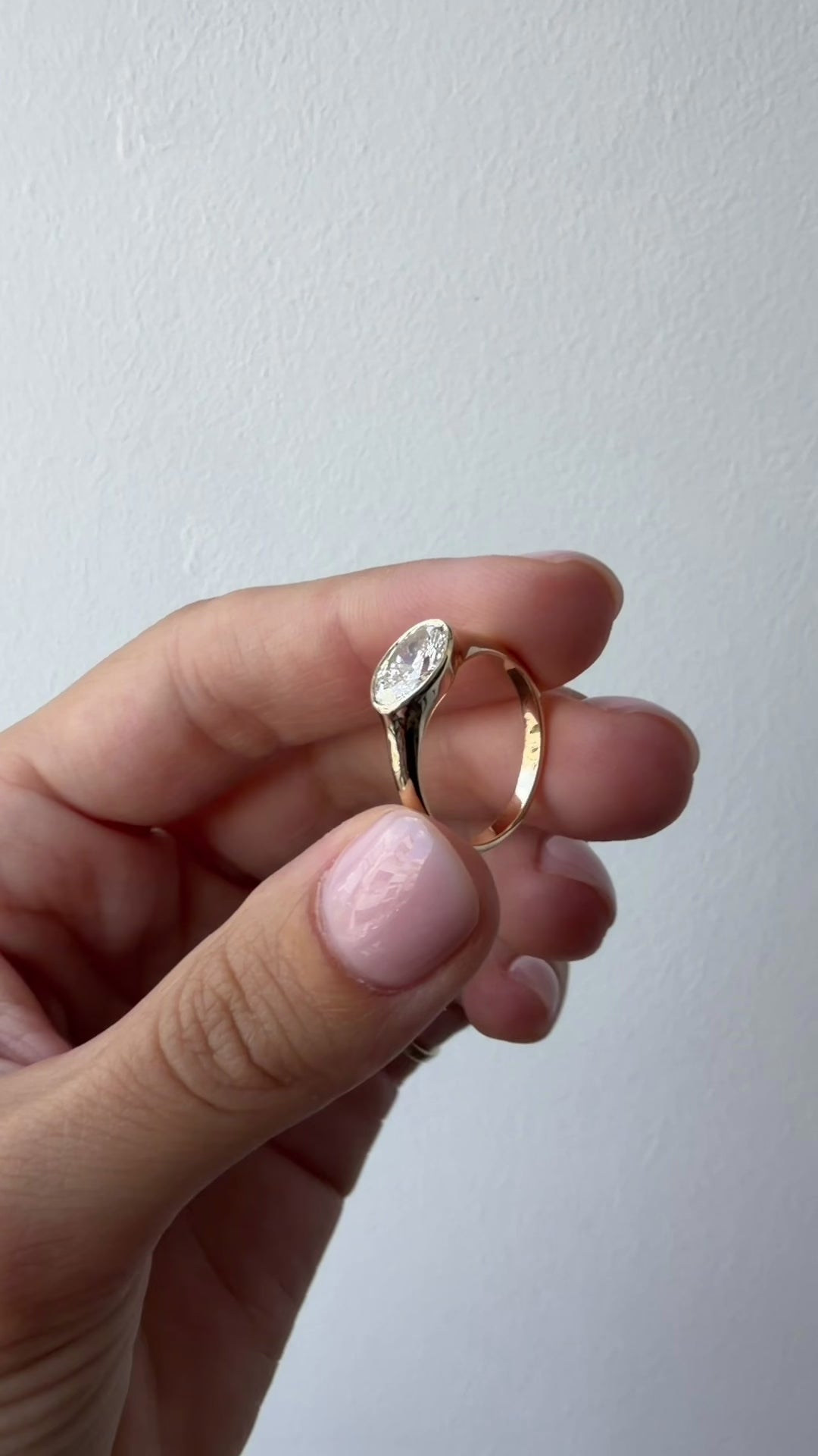 Video of the East West Oval Bezel Ring, east west oval bezel diamond engagement ring in 14K gold